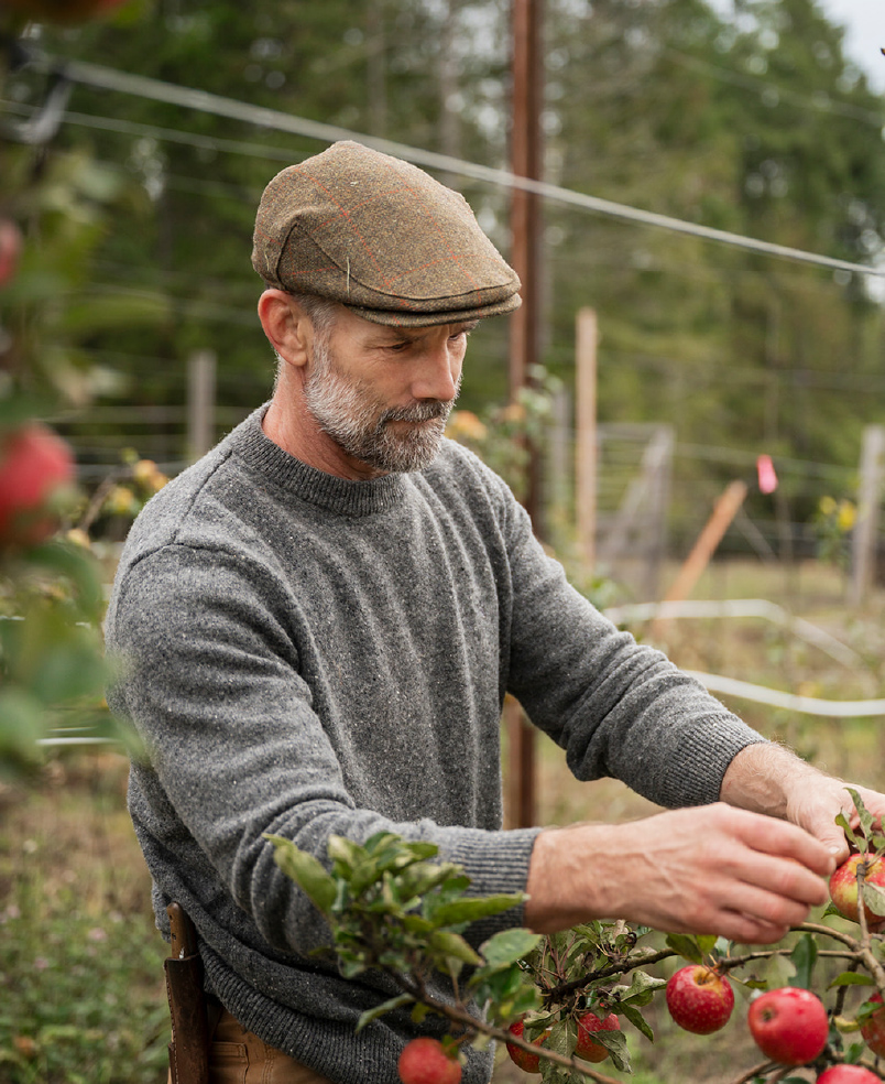 Lance picking apples